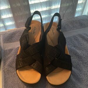 Clarks Black Suede Sandals with Elegant Crossed Design